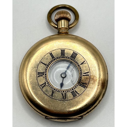 312 - A gold plated half hunter pocket watch, cased