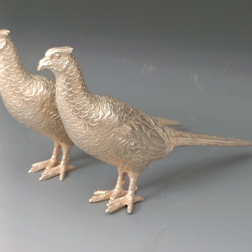 390 - A pair of modern silver pheasants, Birmingham 1974, 9.63 ozt, 16 cm (2)