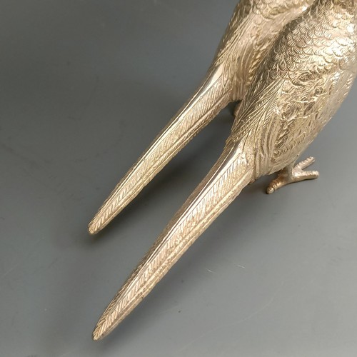 390 - A pair of modern silver pheasants, Birmingham 1974, 9.63 ozt, 16 cm (2)