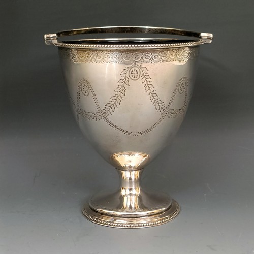 424 - A George III silver swing handled basket, with a blue glass liner, London 1790, 6.54 ozt