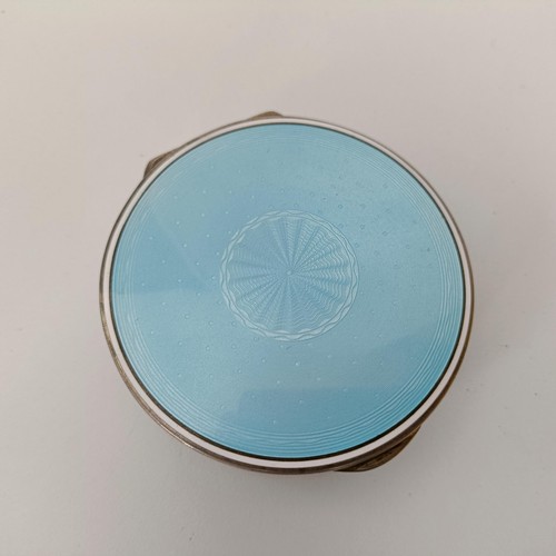 454 - A Continental silver coloured metal and blue enamel circular box, all in 170 g