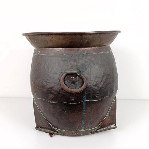 709 - An Arts & Crafts style beaten copper jardinière, with ring handles, 35 cm diameter