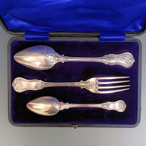 435 - A French silver coloured metal Christening set, comprising a fork, spoon and a teaspoon, cased