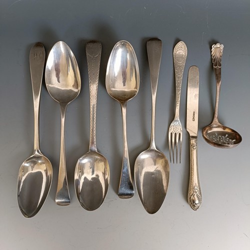 442 - A George III Old English pattern serving spoon, four other spoons, a fork, a ladle, 11.1 ozt and a s... 