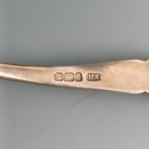 442 - A George III Old English pattern serving spoon, four other spoons, a fork, a ladle, 11.1 ozt and a s... 