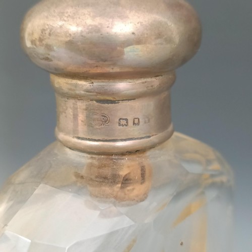 561 - A George V silver and glass hip flask, marks rubbed