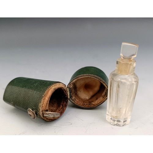 562 - A 19th century shagreen and silver coloured metal perfume bottle holder, with a cut glass perfume bo... 