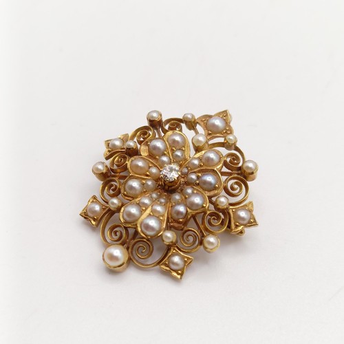 16 - ***Withdrawn*** An 18ct gold, diamond and seed pearl brooch