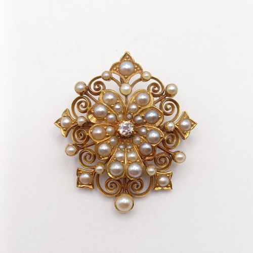 16 - ***Withdrawn*** An 18ct gold, diamond and seed pearl brooch