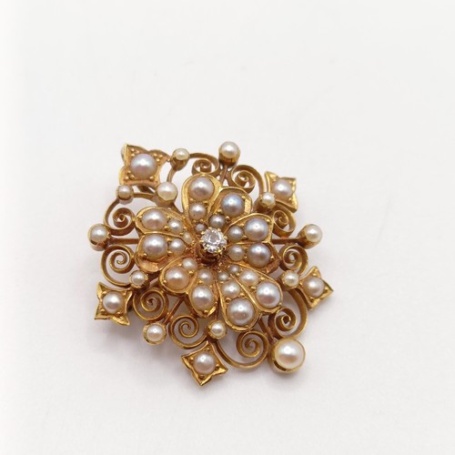 16 - ***Withdrawn*** An 18ct gold, diamond and seed pearl brooch