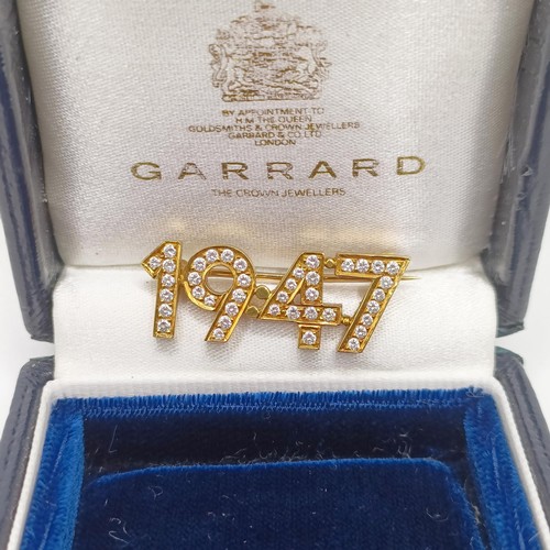 37 - An 18ct gold and diamond 1947 brooch, by Garrard & Co, in a later Garrard & Co box