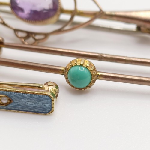 65 - A 9ct gold and purple stone bar brooch, and three other brooches (4)