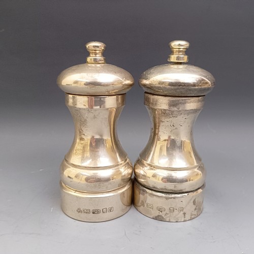 581 - A pair of Elizabeth II silver salt and pepper grinders, London 1961