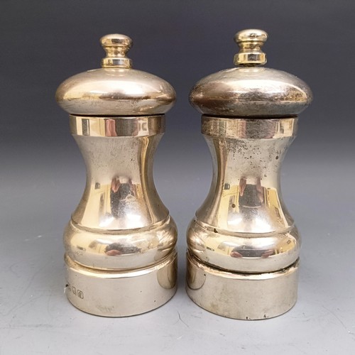 581 - A pair of Elizabeth II silver salt and pepper grinders, London 1961