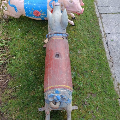 834 - A late 19th/early 20th century large carved and painted wood double seat carousel pig, 140 cm wide  ... 