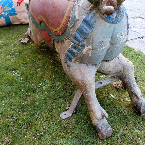 834 - A late 19th/early 20th century large carved and painted wood double seat carousel pig, 140 cm wide  ... 