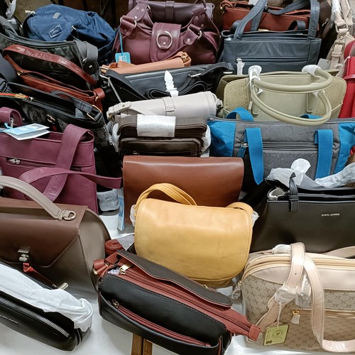 703 - Assorted handbags, as removed from The Wincanton Cobblers