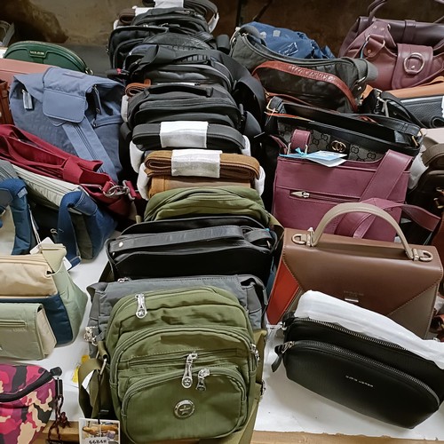 703 - Assorted handbags, as removed from The Wincanton Cobblers