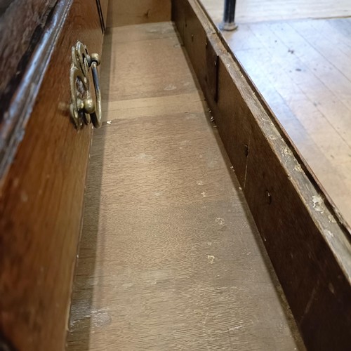 867 - A 18th century oak bureau, with original handles, 92 cm wide