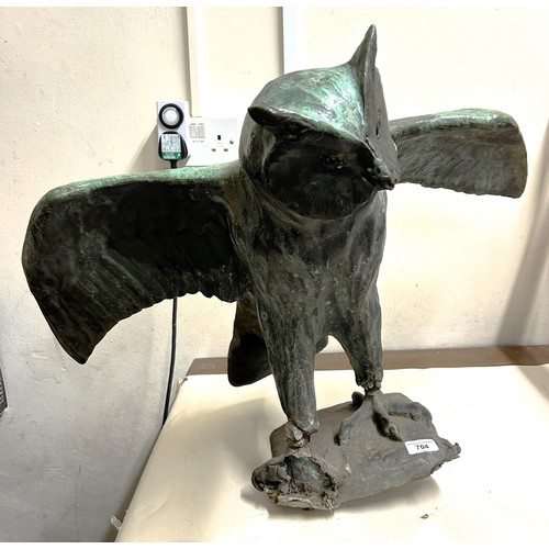 704 - A weathered bronze owl, damage to a foot, understood to have been removed from a country house gatep... 