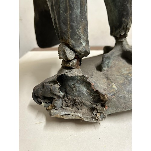 704 - A weathered bronze owl, damage to a foot, understood to have been removed from a country house gatep... 