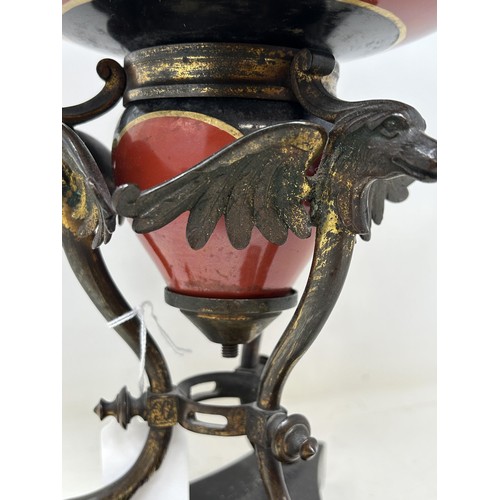 708 - A Victorian porcelain oil lamp base, on a gilt metal mount, 35 cm high