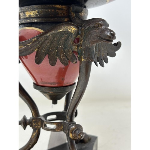 708 - A Victorian porcelain oil lamp base, on a gilt metal mount, 35 cm high