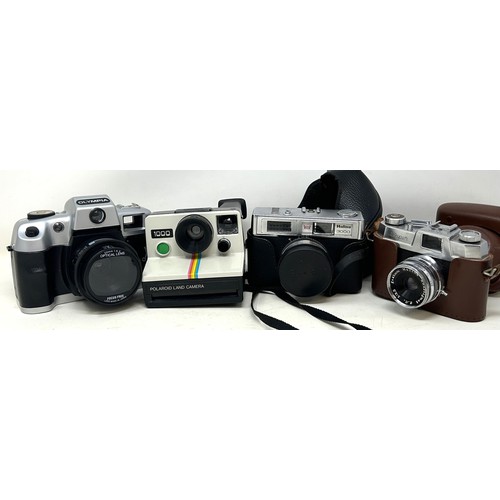 712 - Assorted cameras (4 boxes)