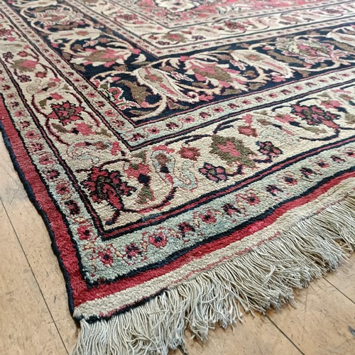 956 - An antique Persian handmade Dorokhsh carpet, 403 x 305