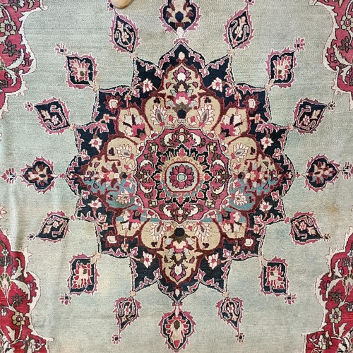 956 - An antique Persian handmade Dorokhsh carpet, 403 x 305