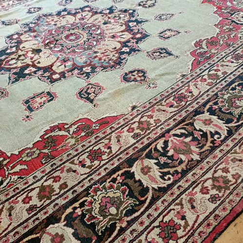 956 - An antique Persian handmade Dorokhsh carpet, 403 x 305