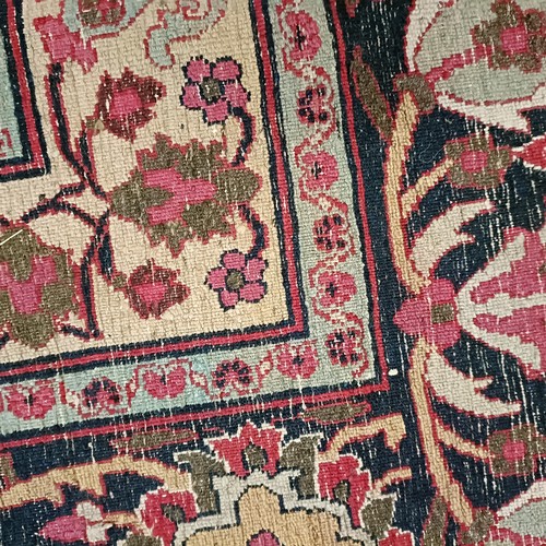 956 - An antique Persian handmade Dorokhsh carpet, 403 x 305