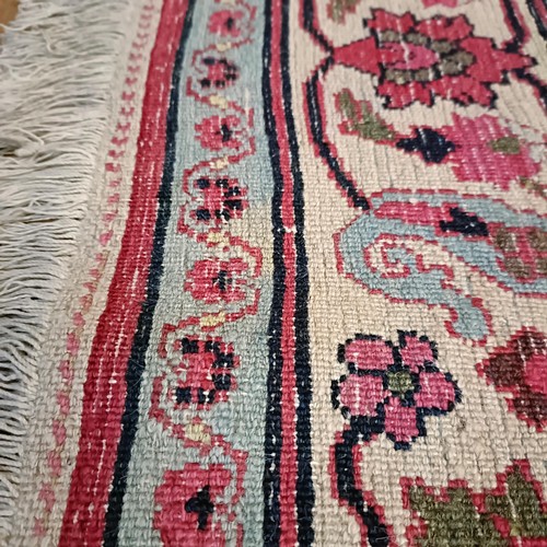 956 - An antique Persian handmade Dorokhsh carpet, 403 x 305