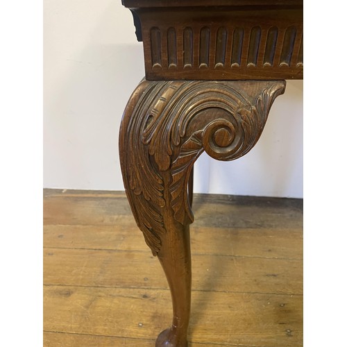 937 - A 19th century mahogany side table, with single drawer to the side on carved cabriole legs to pad fe... 