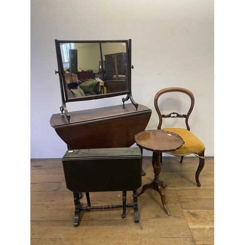 884 - A mahogany drop leaf table, 85 cm wide, a Sutherland table, a bedroom mirror, a wine table, and a si... 