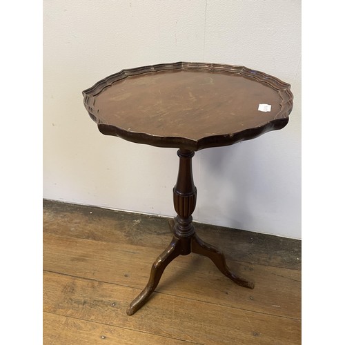 884 - A mahogany drop leaf table, 85 cm wide, a Sutherland table, a bedroom mirror, a wine table, and a si... 