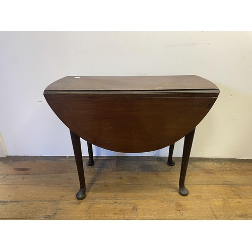 884 - A mahogany drop leaf table, 85 cm wide, a Sutherland table, a bedroom mirror, a wine table, and a si... 