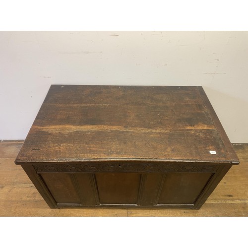 863 - A carved oak coffer, 108 cm wide