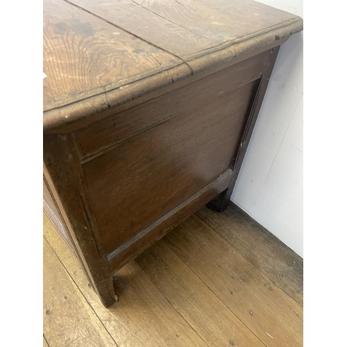 878 - An oak coffer, 118 cm wide