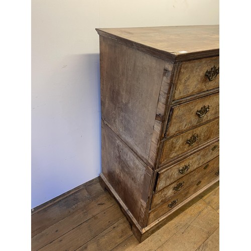 870 - A 19th century walnut chest, having six drawers, 113 cm wide