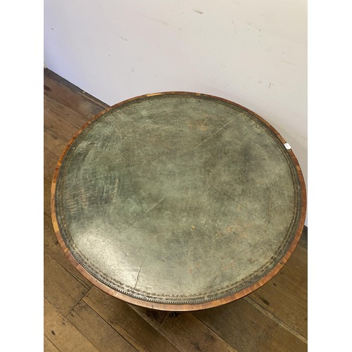 847 - A 19th century mahogany drum table, with a tooled and gilt leather inset top, having four frieze dra... 