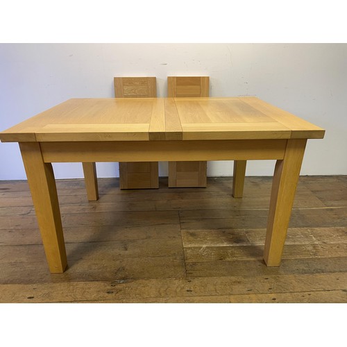 837 - A modern light wood extending dining table, the top 188 x 92 cm, with two leaves, 33 cm each, a set ... 