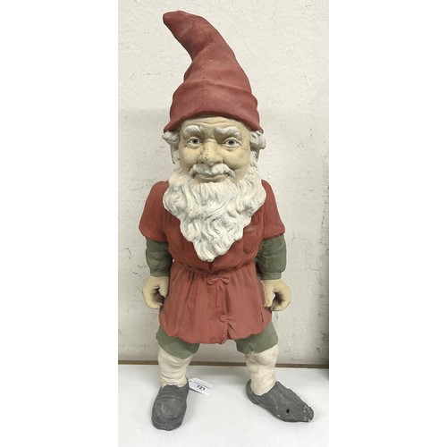 721 - A pottery garden gnome, 62 cm high