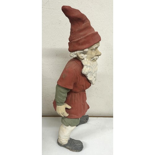 721 - A pottery garden gnome, 62 cm high