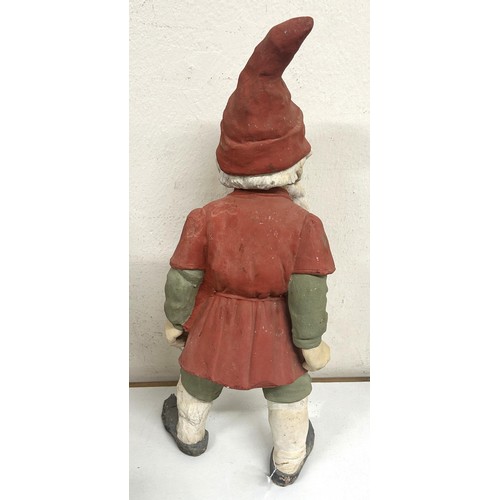 721 - A pottery garden gnome, 62 cm high