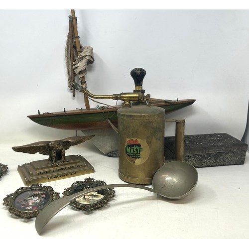 724 - An early 20th century pond yacht, a Chinese silver plated box, decorated dragon, and assorted metalw... 