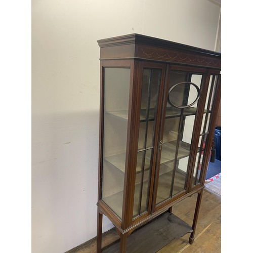 841 - An early 20th century mahogany display cabinet, 90 cm wide