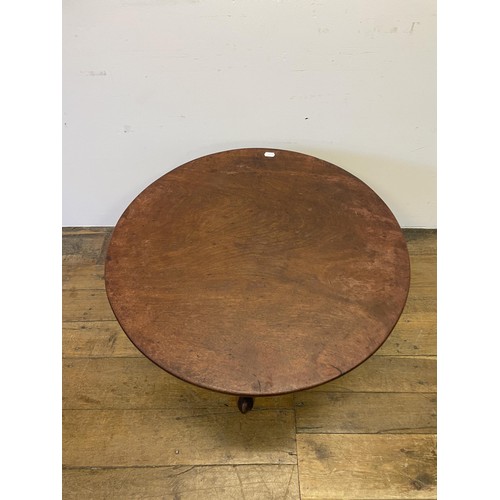 838 - A mahogany wine table, on a column support to tripod base, 84 cm diameter