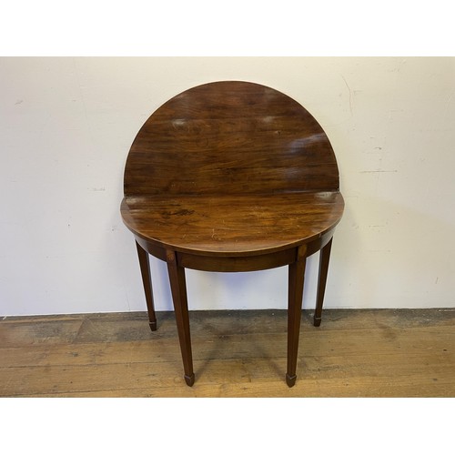 849 - A mahogany demi-lune folding tea table, 87 cm wide