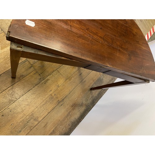 849 - A mahogany demi-lune folding tea table, 87 cm wide